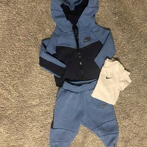 Nike Jumpsuit Size 6-9 Months & matching onesie Size 9 Months.
